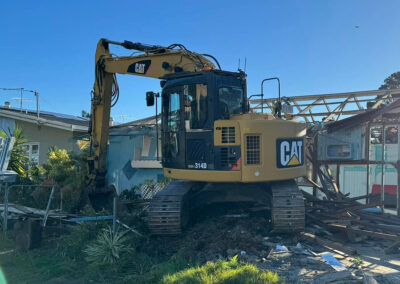 Licensed asbestos removal specialists working on a residential property in Brisbane